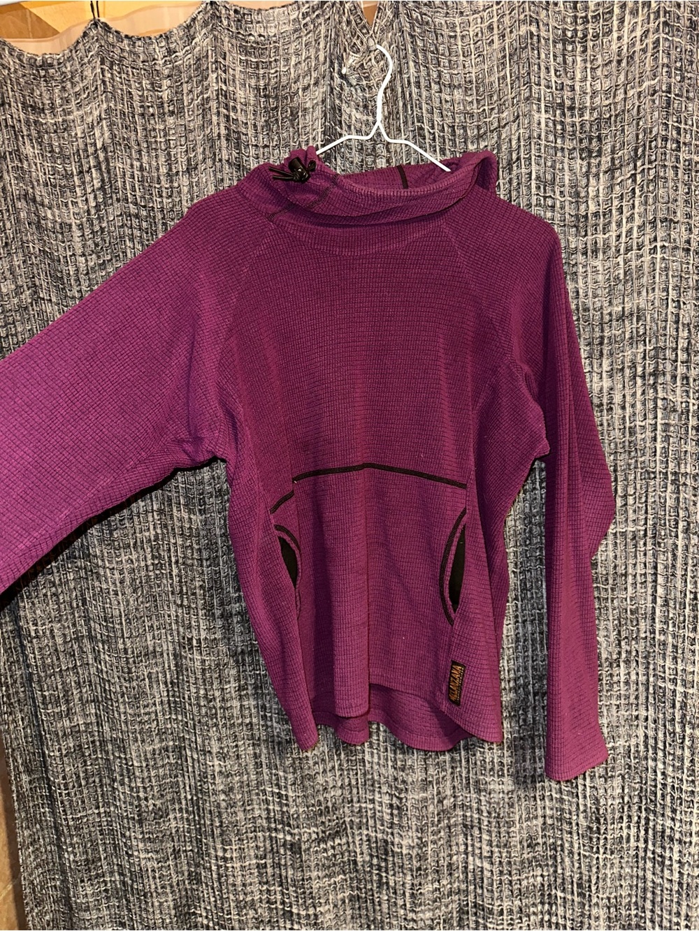 Melanzana magenta waffle-knit pullover with orange logo